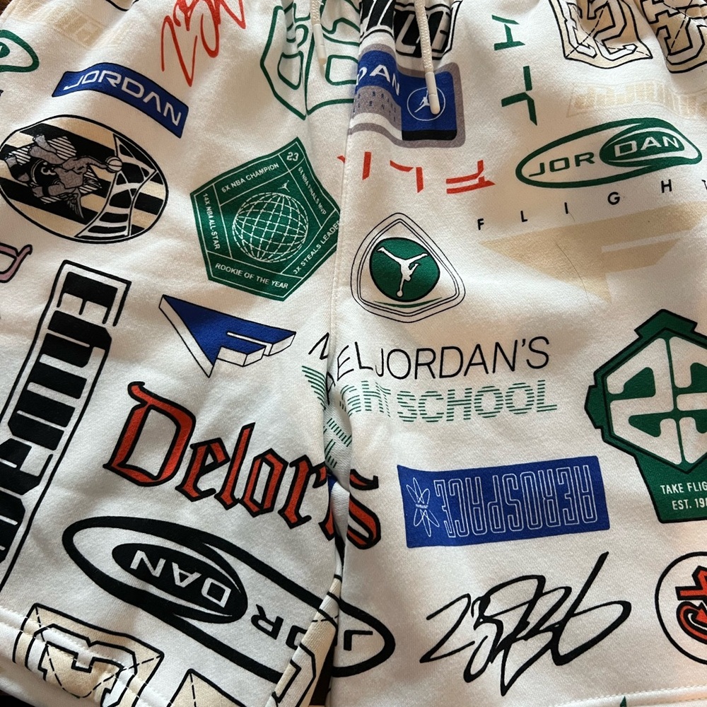 Jordan White Shorts with Red and Green Graphics